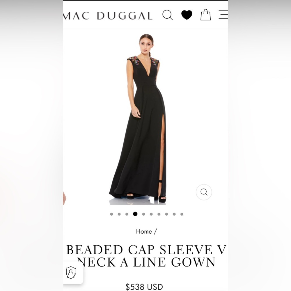 A-line gown, plunging neckline, bead-and-rhinestone floral accents on shoulders.